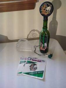 lot 212 image: UND Lot - Light-Up Bottle, Decals & Presidents Club Glass Paperweight