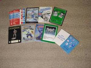 lot 251 image: Variety of Vintage Fighting Sioux Magazines - Playoffs Programs, Yearbooks, Etc