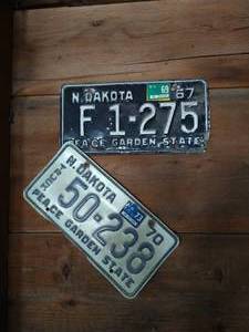 lot 305 image: (2) Vintage License Plates