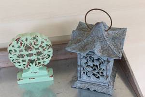 lot 18 image: Decorative Metal Lantern and Distressed Mint Green Filigree Sculpture