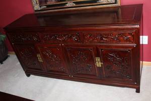 Antique Wooden Sideboard with Intricate Carved Design