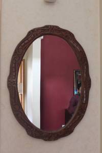 lot 39 image: Antique Oval Wall Mirror with Carved Wooden Frame
