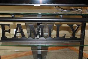 lot 49 image: Decorative Black Metal FAMILY Sign