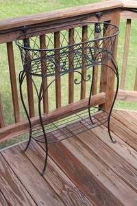 lot 64 image: Vintage Black Wrought Iron Plant Stand with Two Tiers