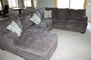 lot A-75 image: Gray Sectional Sofa with Decorative Pillows