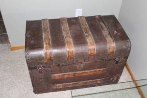 lot 79 image: Antique Wooden and Metal Steamer Trunk with Decorative Straps