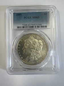 lot 10 image: 1889 Morgan PCGS, MS 63, Brilliant Finish-Free Shipping & Insurance