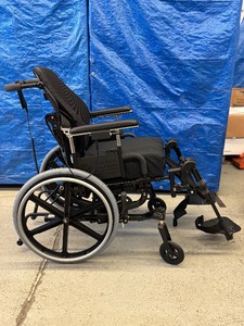 lot 7 image: Quickie Electric Tilt In Space Wheelchair Invacare Matrx Elite E2 Back Wheelchair with Manual - In Like New Condition Needs New Battery However Has Charger & Works Well Without Power Capabilities