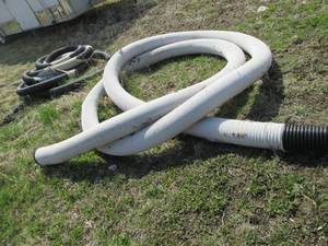lot 22 image: Large roll of 6in plastic drain pip...