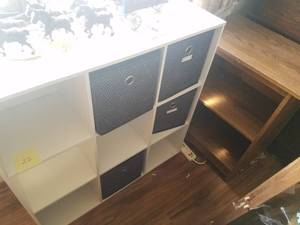 lot 22 image: 9 Cube Organizer with Some Baskets -3 x 3 x 11.5 and Microwave Cart 30 x 23.5 x 15.5