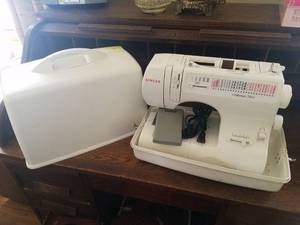 lot 26 image: Singer Millennium Series Sewing Machine in Case