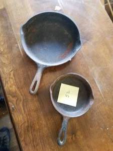 lot 52 image: 2- Cast Iron Fry Pans. 9 34 and #3
