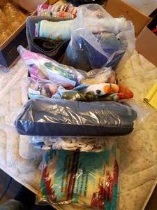 lot 174 image: Box of Throws and Rugs