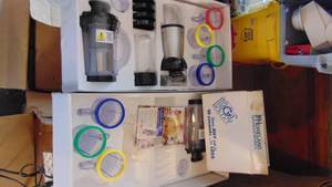 lot 287 image: Box and Half of a Brand-New Magic Bullet