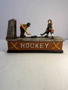 &nbsp;Hockey Player and Goalie Cast Iron Mechanical Bank. This bank is in good working condition.&nbsp;