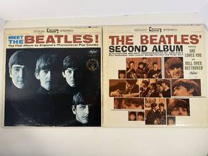 lot 33 image: The Beatles First and Second Albums. A must have for any collection. Albums are in a protective sleeve.