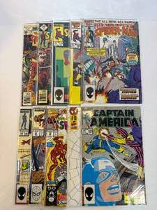 lot 60 image: Marvel Spider-Man and Captain America. All comic books are bagged and boarded individually.