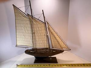 lot 83 image: &nbspOld Wooden Schooner, With A Rich Wood Finish and Cream Colored Fabric Sails.