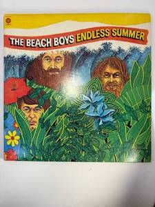 lot 36 image: Beach Boy Endless summer Double Album, With Rare Endless Summer Poster and Photo Album. This album is in a &nbspprotective sleeve.