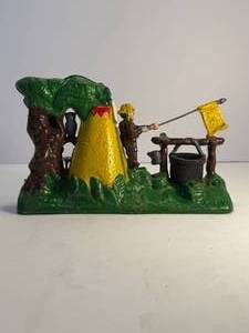 lot 15 image: Boy Scout Camp cast iron mechanical bank. This bank is in good working condition.