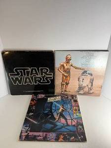lot 29 image: Three Star Wars Albums. All albums are in protective sleeve.