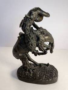 lot 109 image: &nbspRattlesnake Bronze Sculpture by Frederic Remington.