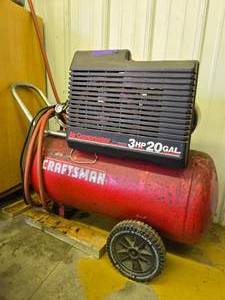 lot 20 image: Working CRAFTSMAN 3hp 20 Gallon Air Compressor wWall Mount Hose Reel