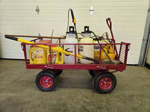 lot 64 image: Excellent LARGE Northern Tool Utility Cart Full of LawnGarden Tools & Supples