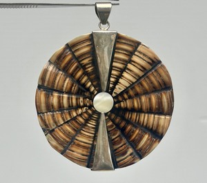 lot 57 image: Large Round Sterling Silver Shell Pendant