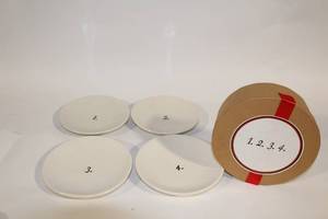 lot 22 image: Set of 4 Magenta Exclusive Dessert Plates with Numbered Design
