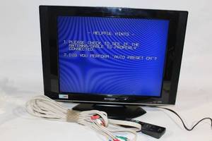 lot 27 image: Sharp LC-20D42U LCD TV with Remote and Cables