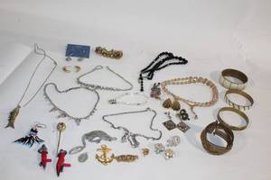 lot 56 image: Assorted Costume Jewelry Collection including Necklaces, Bracelets, and Earrings