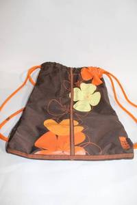 lot 177 image: Brown Drawstring Backpack with Floral Design