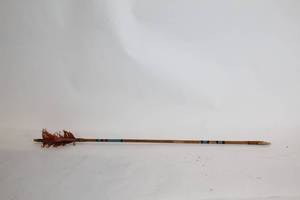 lot 263 image: Vintage Handmade Wooden Arrow with Stone Tip and Feather Fletching
