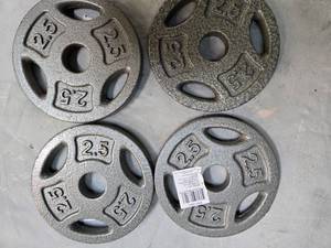 lot 59 image: Lot of Four 2.5Lb weight Plates ) new)
