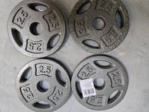lot 62 image: Lot of Four 2.5Lb weight Plates ) new)