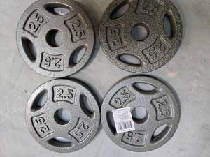 lot 64 image: Lot of Four 2.5Lb weight Plates ) new)