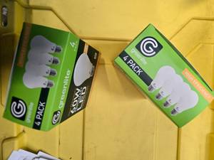 lot 91 image: Lot of 8 LED Greenlite 60W Equivalent Light Bulbs (4 packs in each of the two boxes) New