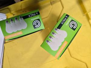 lot 93 image: Lot of 8 LED Greenlite 60W Equivalent Light Bulbs (4 packs in each of the two boxes) New