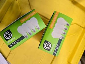 lot 97 image: Lot of 8 LED Greenlite 60W Equivalent Light Bulbs (4 packs in each of the two boxes) New