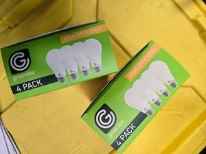 lot 98 image: Lot of 8 LED Greenlite 60W Equivalent Light Bulbs (4 packs in each of the two boxes) New