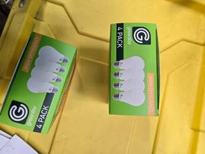 lot 99 image: Lot of 8 LED Greenlite 60W Equivalent Light Bulbs (4 packs in each of the two boxes) New