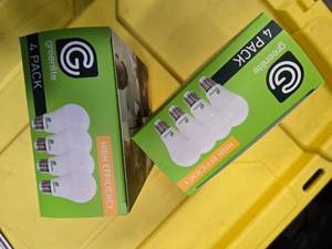 lot 101 image: Lot of 8 LED Greenlite 100W Equivalent Light Bulbs (4 packs in each of the two boxes) New