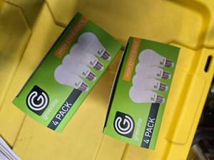 lot 111 image: Lot of 8 LED Greenlite 100W Equivalent Light Bulbs (4 packs in each of the two boxes) New