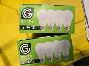 lot 78 image: Lot of 8 LED Greenlite 100W Equivalent Light Bulbs (4 packs in each of the two boxes) New