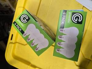 lot 120 image: Lot of 8 LED Greenlite 100W Equivalent Light Bulbs (4 packs in each of the two boxes) New