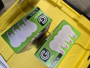 lot 122 image: Lot of 8 LED Greenlite 100W Equivalent Light Bulbs (4 packs in each of the two boxes) New