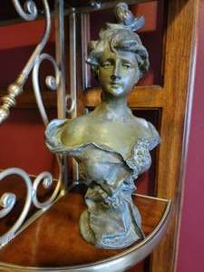 lot 99 image: Art Nouveau Spelter Bust Statue  Maiden with Floral Motif