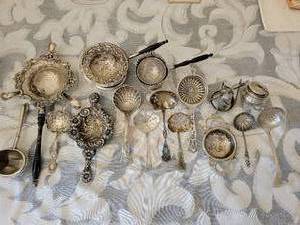lot 93 image: Antique Sterling Silver Tea Strainers Seives  253 grams whandles