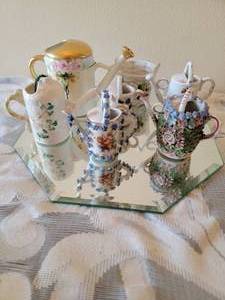 lot 192 image: Sweet Petite Porcelain Watering Can Collection